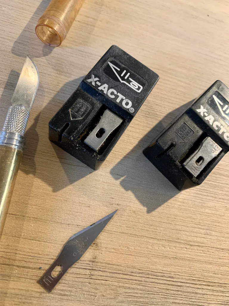 X-Acto knife and spare blades photo 1