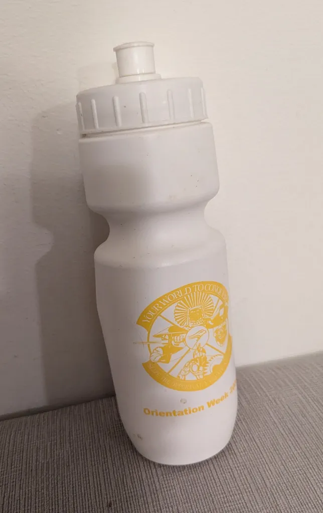 White Water Bottle with Yellow Logo photo 1