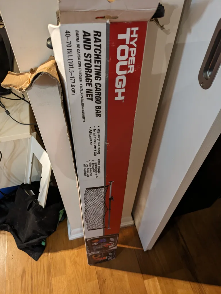 Cargo bar and storage net photo 1