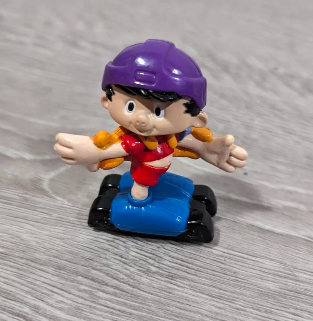 Vintage Roller Skating Toy photo 1