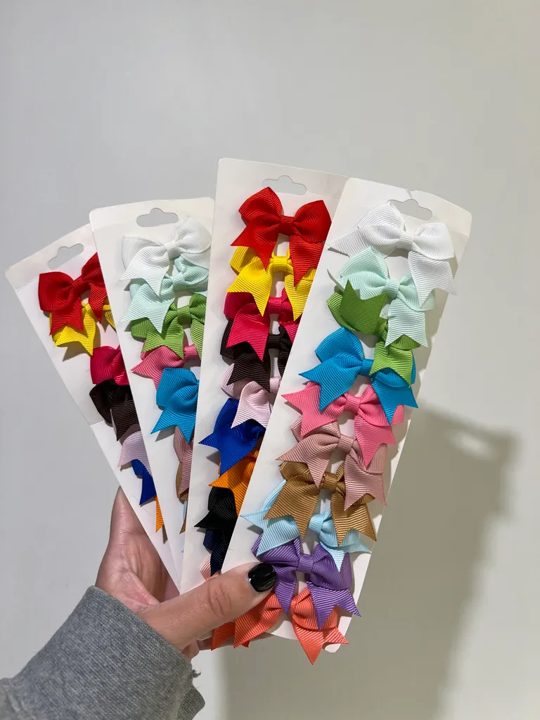 Cute never used bow hair clips  photo 1