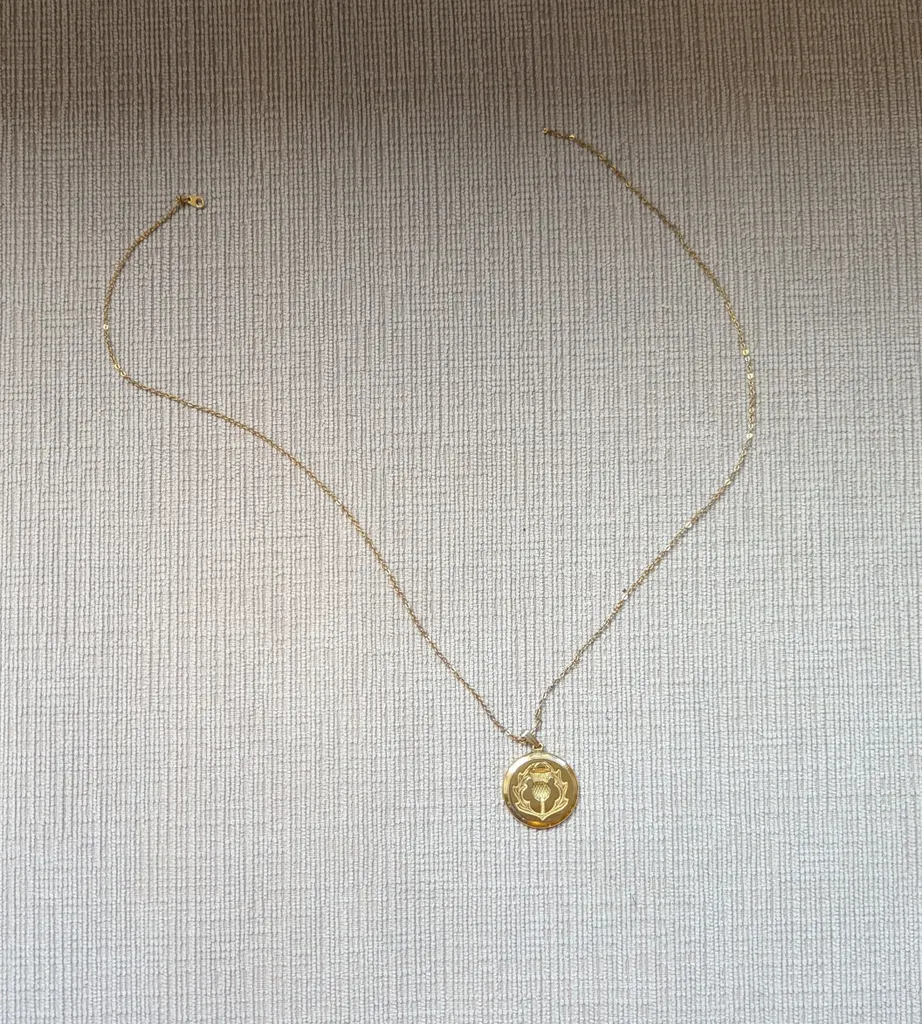 Gold-tone Thistle Pendant Necklace photo 1