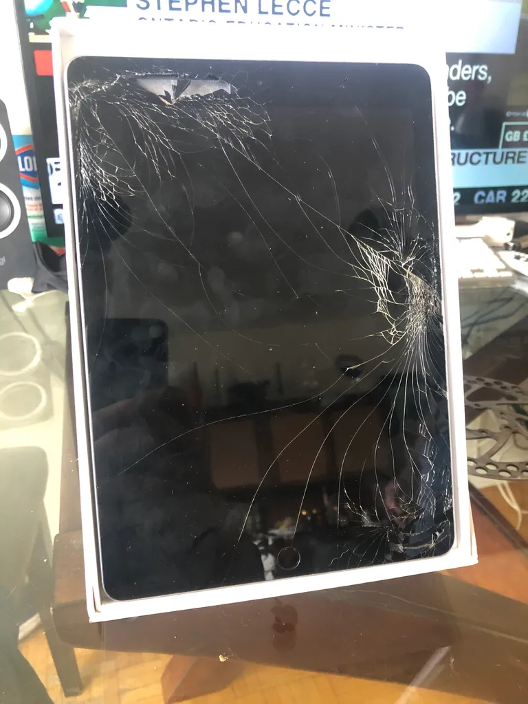 6th Generation iPad 64gb - Activation Locked - Broken Glass photo 1