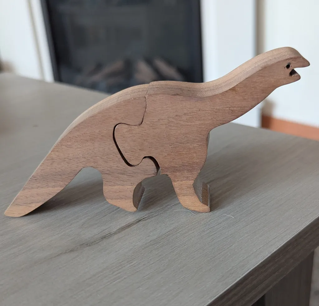 Wooden Dinosaur Puzzle Toy photo 1