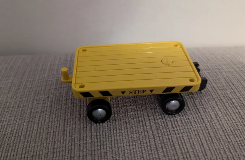 Yellow Toy Flatbed Trailer photo 1