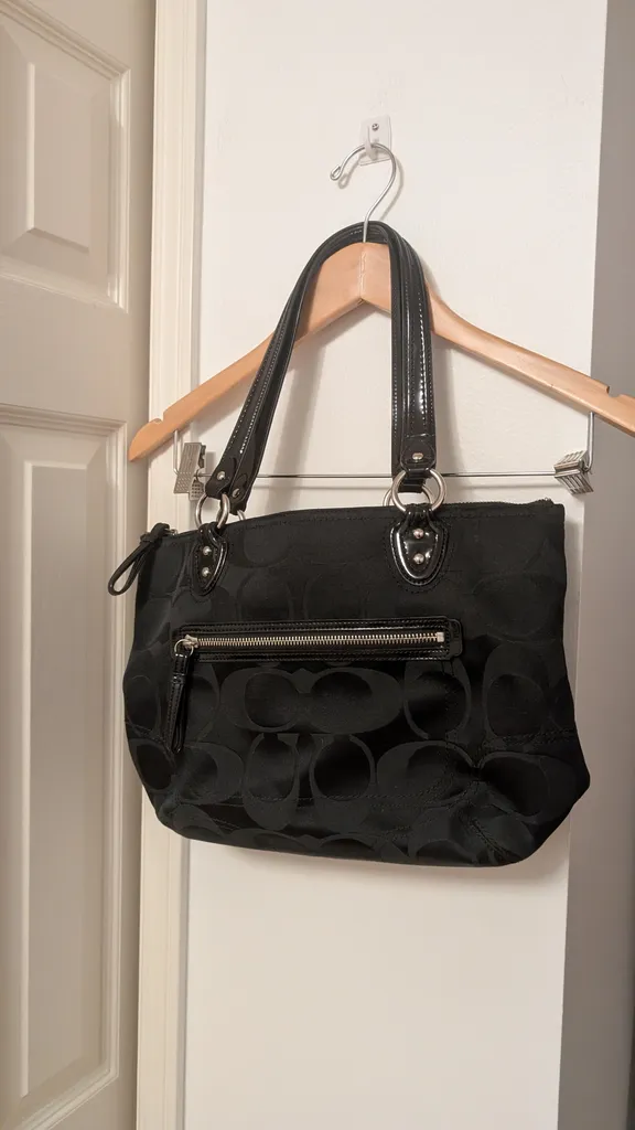 Coach canvas bag in black exterior and teal interior photo 1