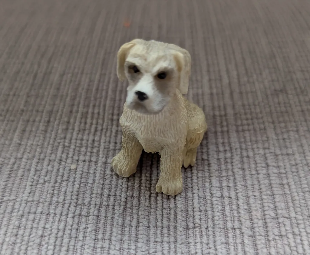 Sitting Dog Figurine photo 1