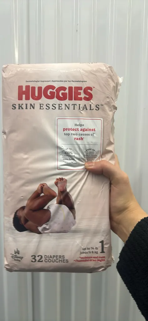 unopened package of huggies  photo 1