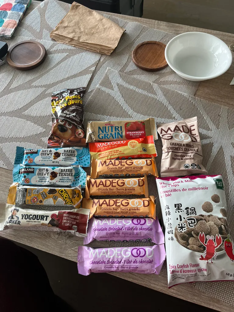 Assorted granola bars and snacks photo 1