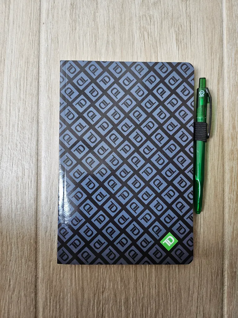 Notebook and pen photo 1