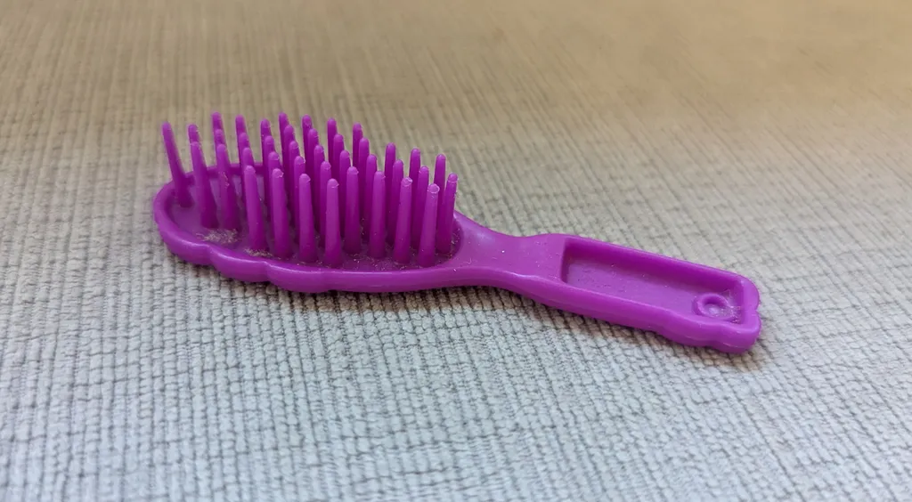 Purple Plastic Hairbrush Toy photo 1
