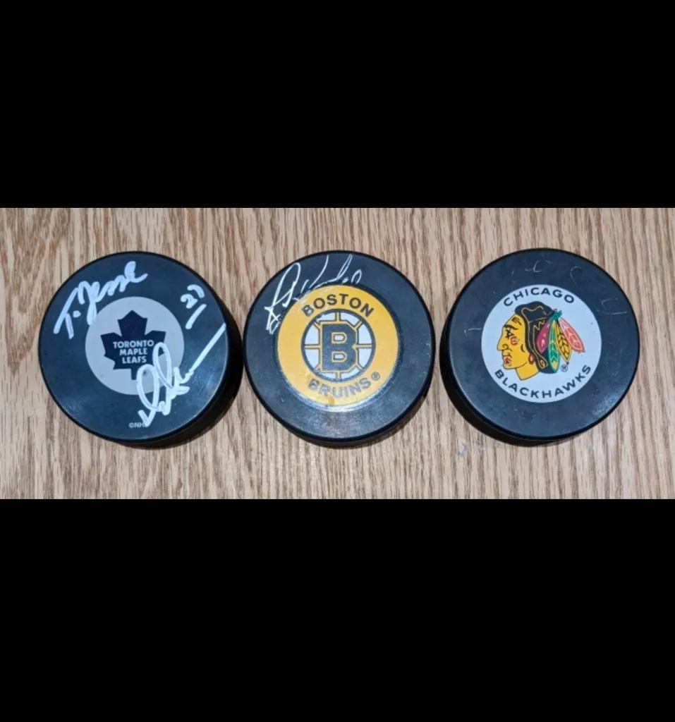 Various Signed Pucks photo 1
