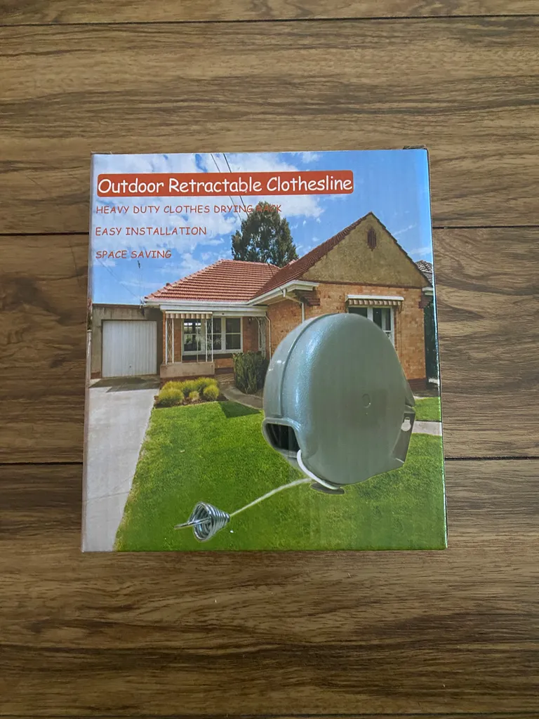 Retractable clothesline outdoor photo 1