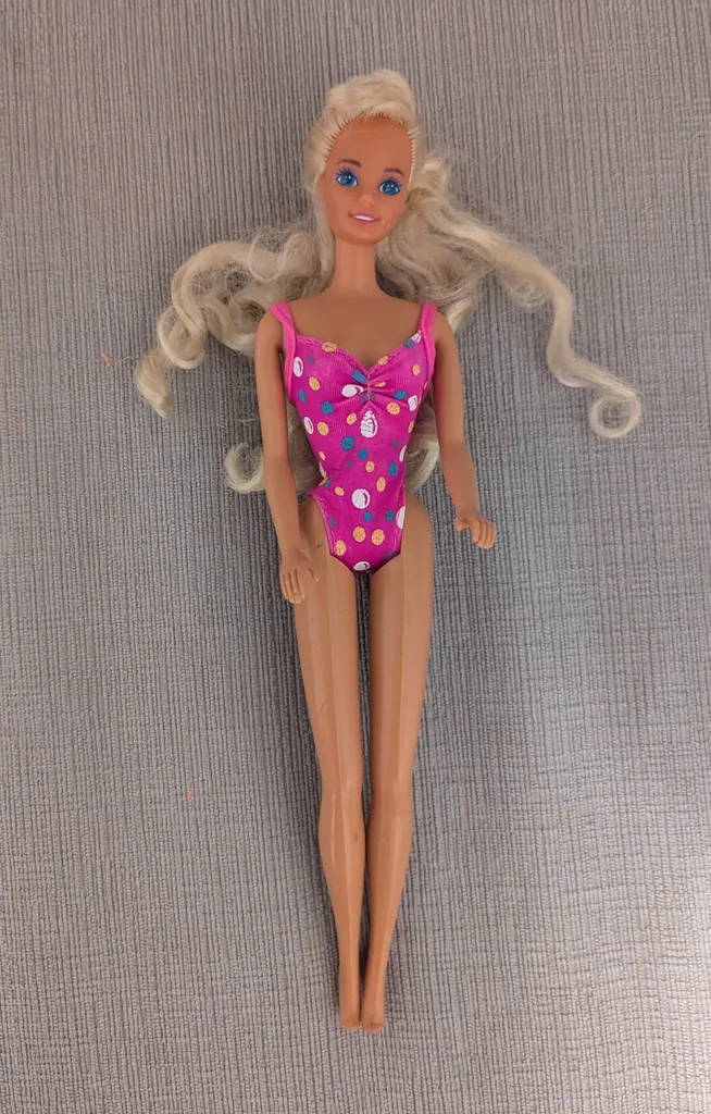 Vintage Barbie Doll with Pink and Blue Swimsuit photo 1