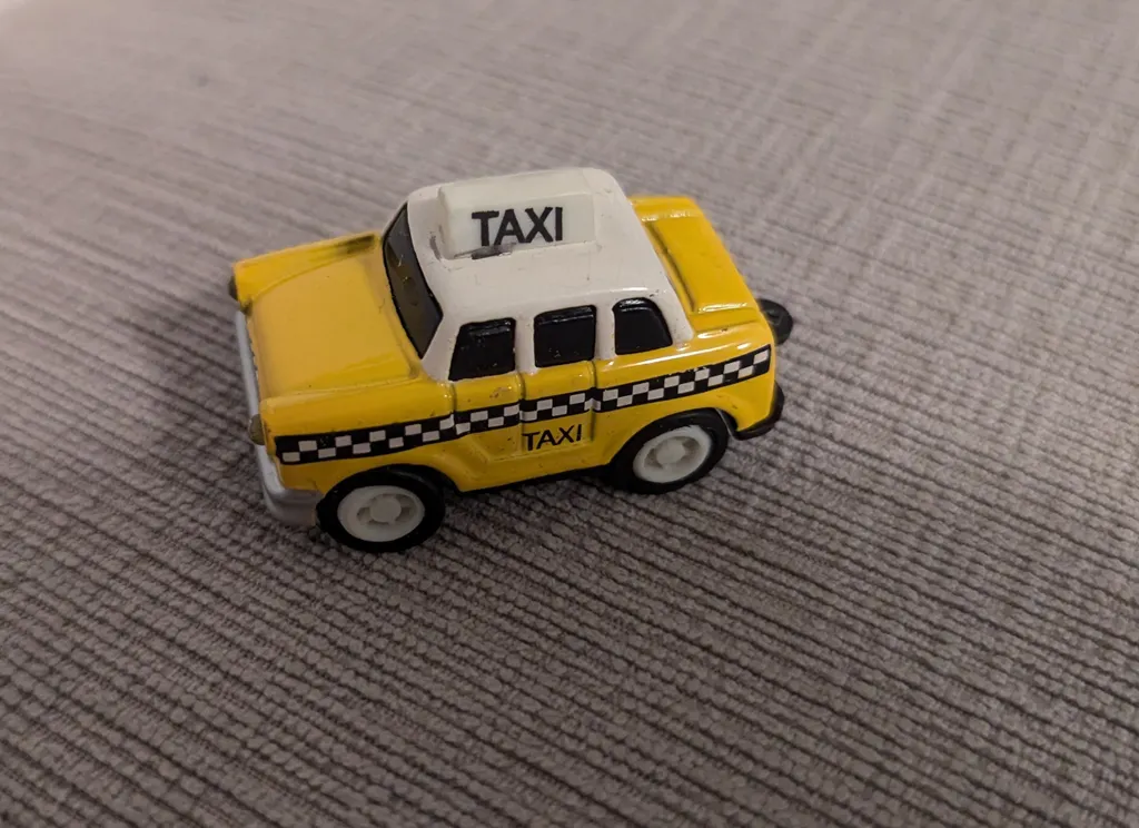 Yellow Taxi Toy Car photo 1