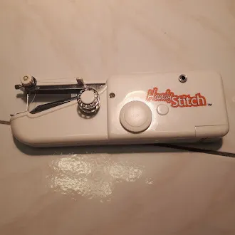 Handy Stitch Hand-Held Sewing Machine photo 1