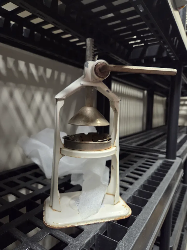 Antique orange juicer photo 1