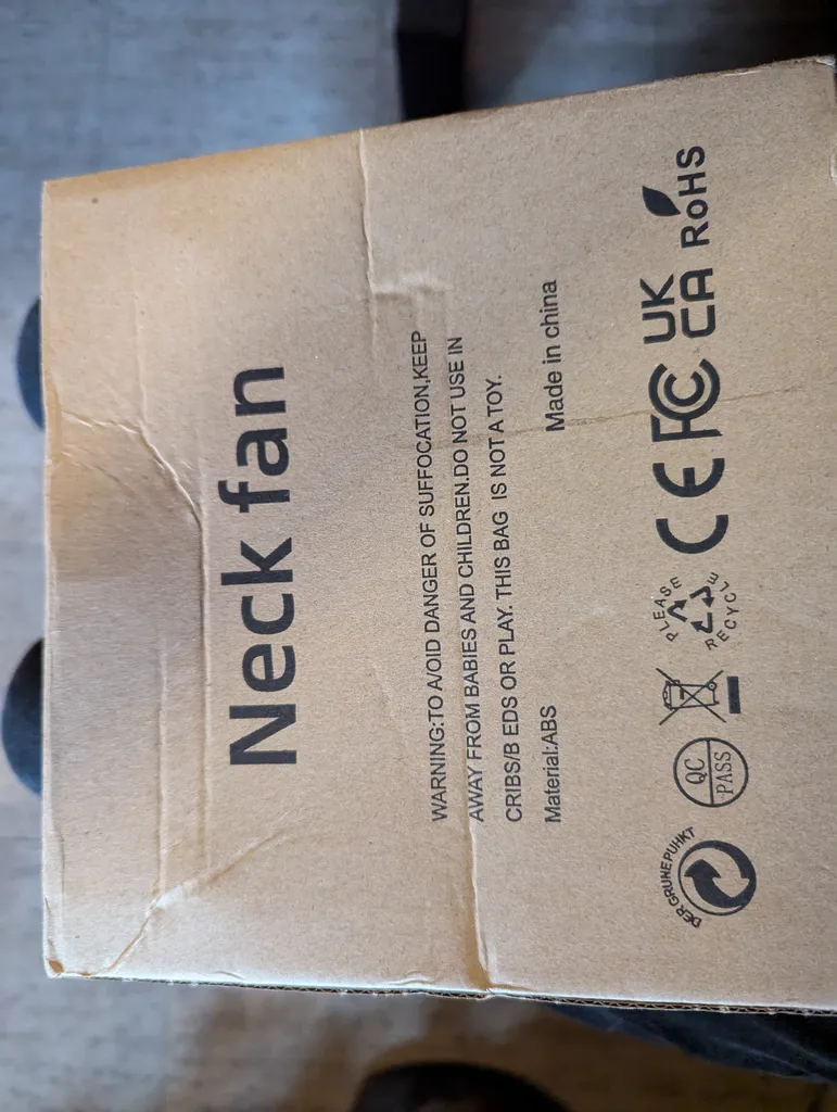 Brand new inbox neck fan. Charging cable Inc.  photo 1