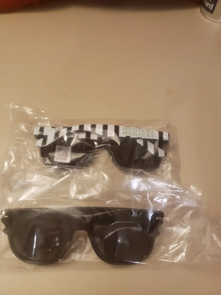 2 brand new sunglasses photo 1