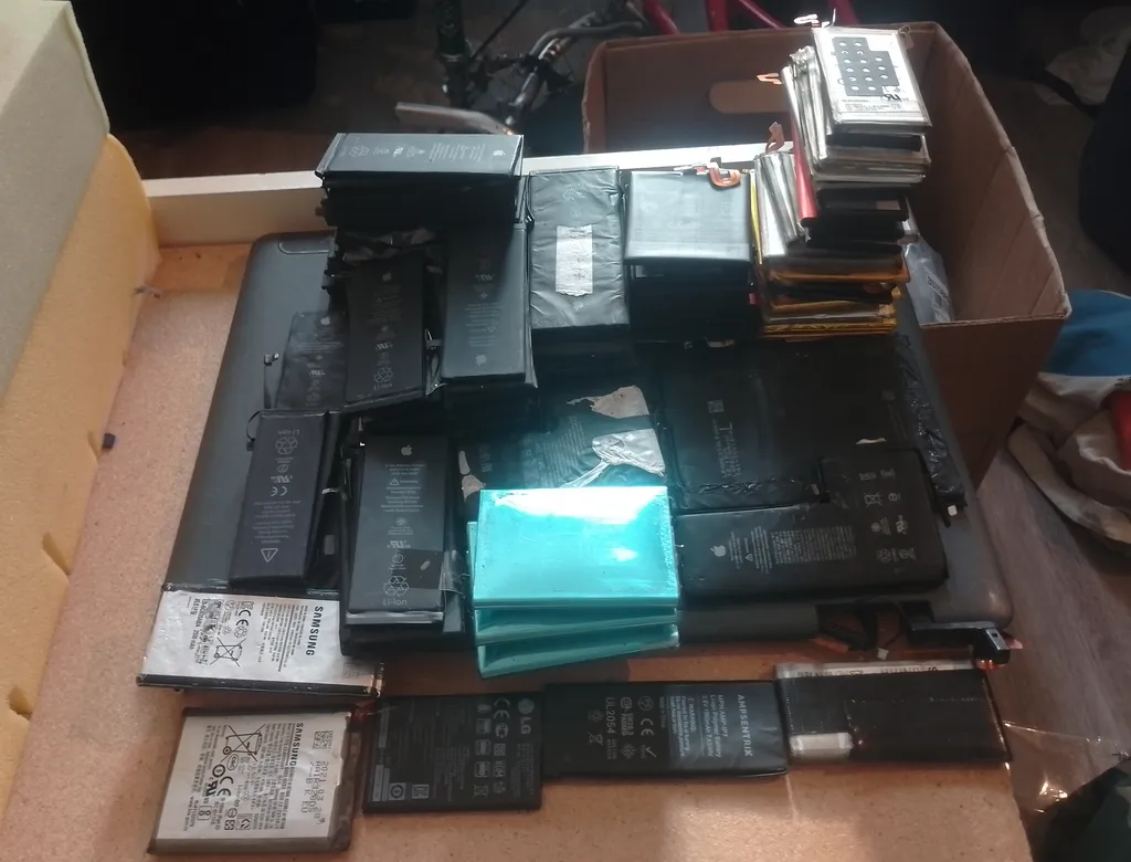 Obscene Amount of untested phone batteries photo 1