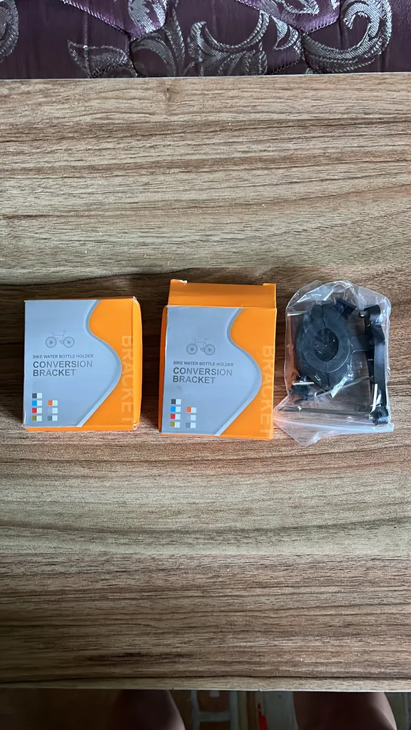 Bike bottle holder x 4, kick stand and brake parts photo 1