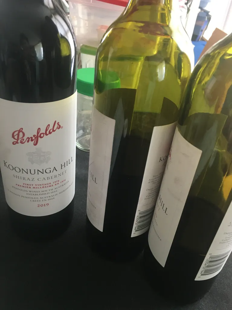 Wine full and two open.  photo 1