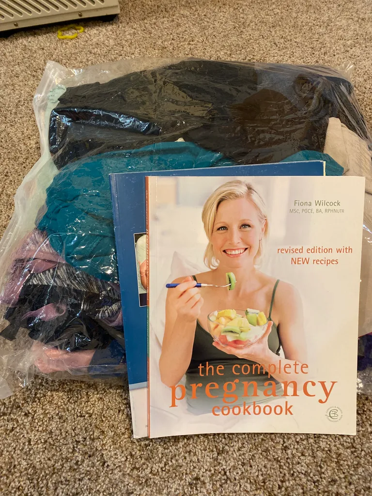 Maternity clothes and books photo 1