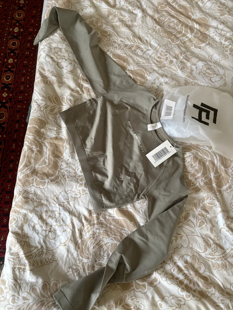 Long sleeved cropped athletic top from First Health photo 1