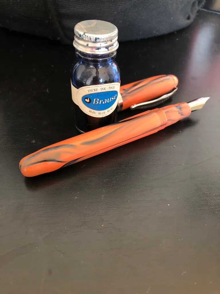 Fountain pen & blue ink photo 1