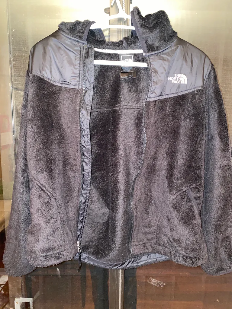 North face fuzzy jacket  photo 1