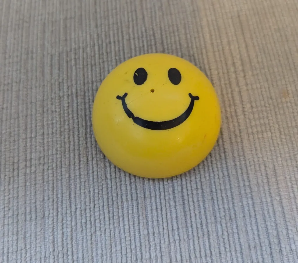 Yellow Smiley Face Collectible Pop Up Toy photo 1