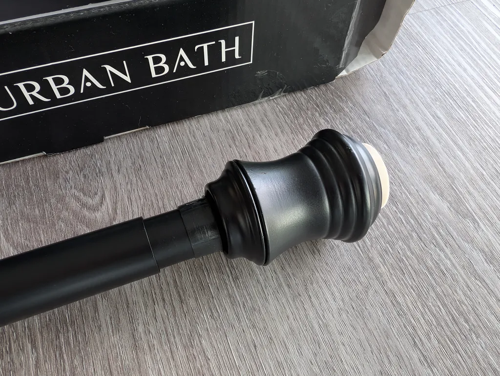 Shower tension/curtain rod photo 1