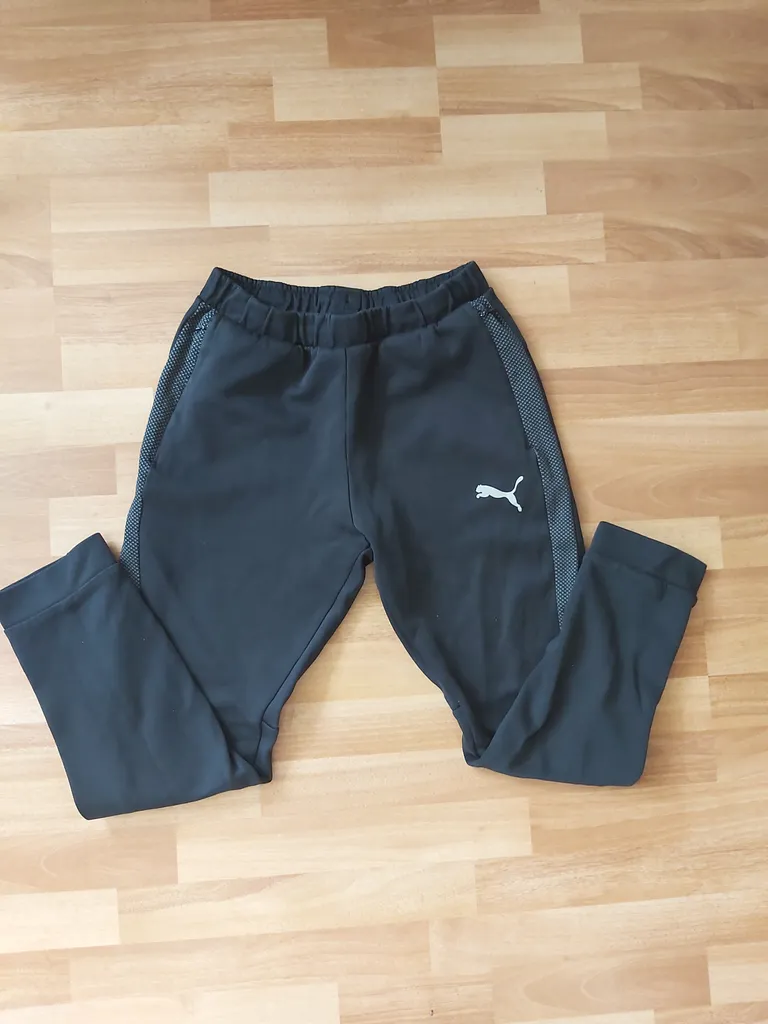 PUMA black joggers with grey detailing photo 1