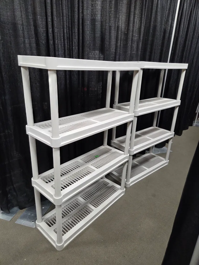 2 plastic  shelf units photo 1