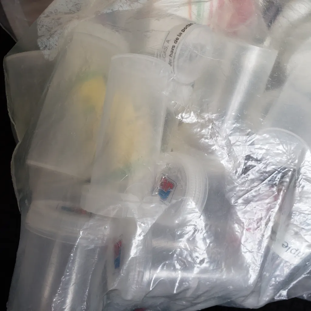 Empty plastic pill containers  photo 1