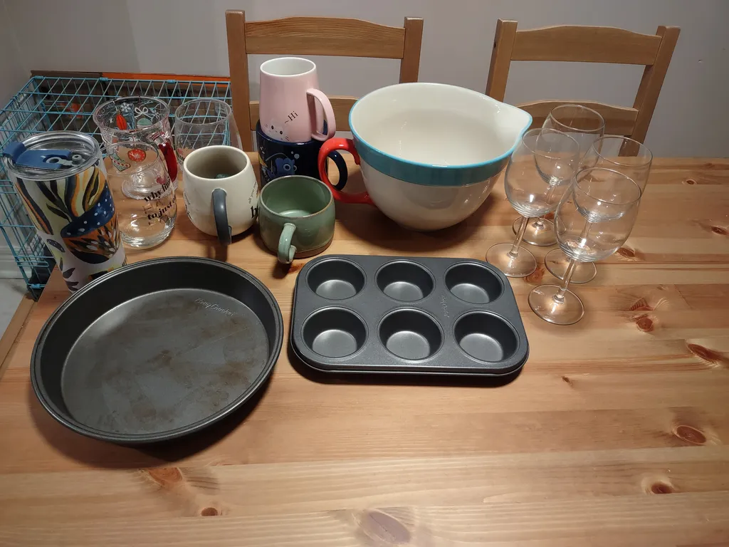 Bundle of baking pans, a mixing bowl, mugs, and wine glasses photo 1