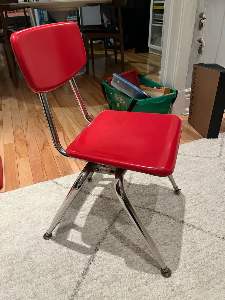 Chrome/red kids chair photo 1