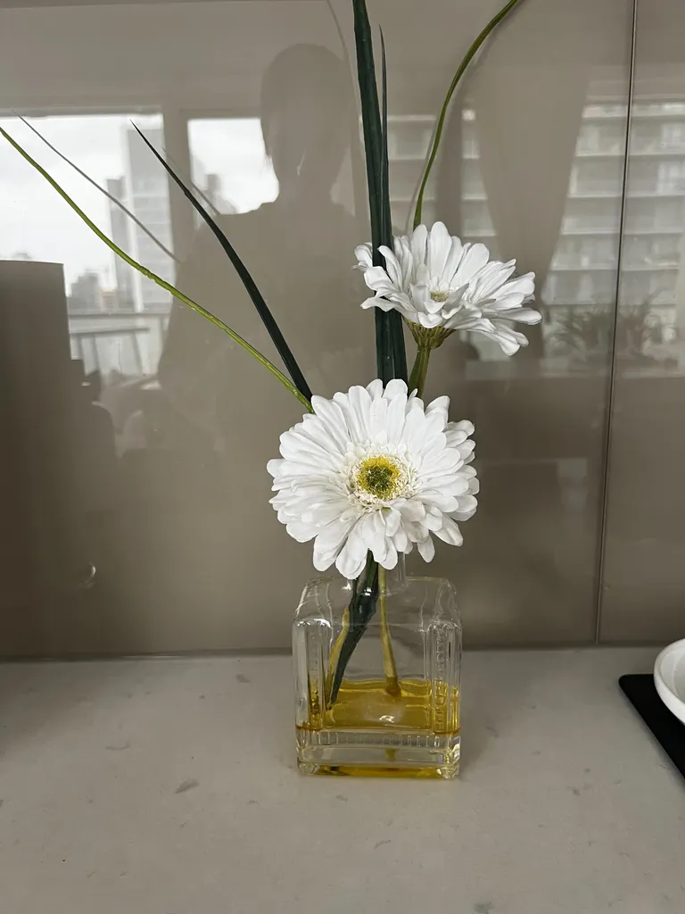 Faux floral arrangement photo 1