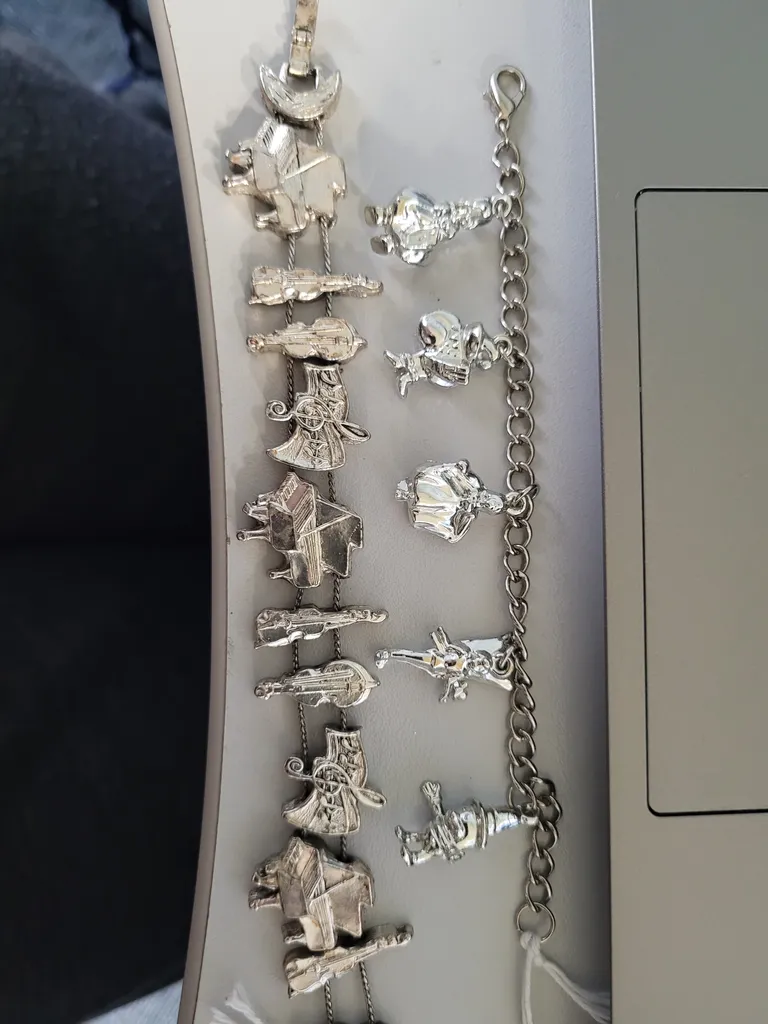 Two charm style bracelets  photo 1