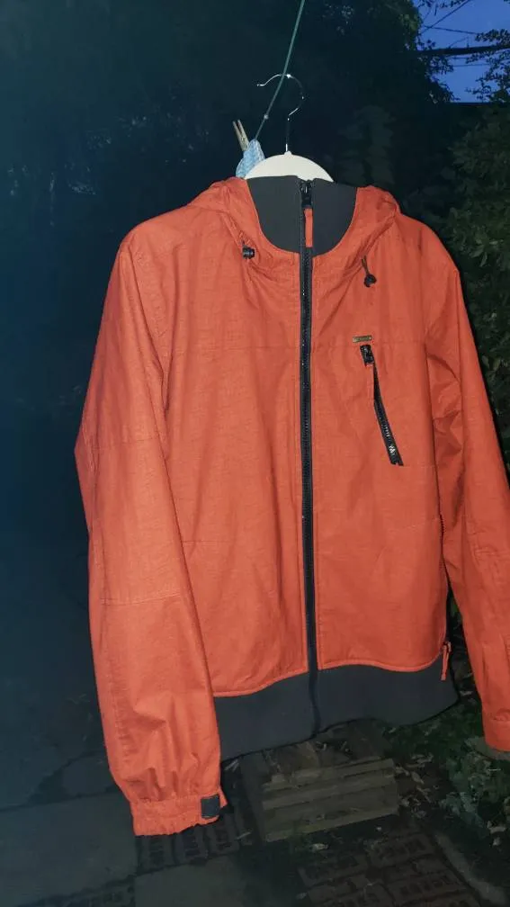 Orangey Rain Jacket Size Small photo 1
