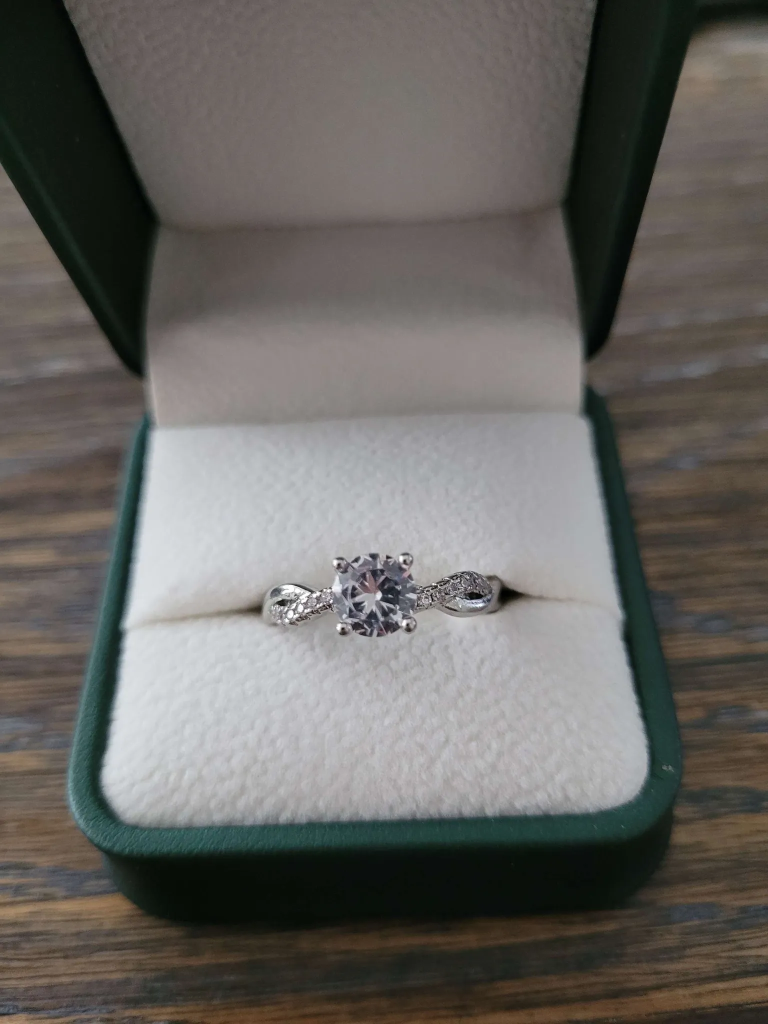 Pretty cubic twist zirconia ring and box photo 1