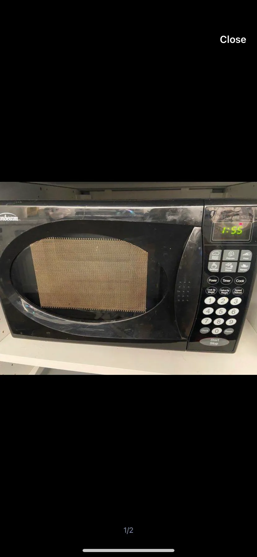 Repost! Small Black Microwave photo 1
