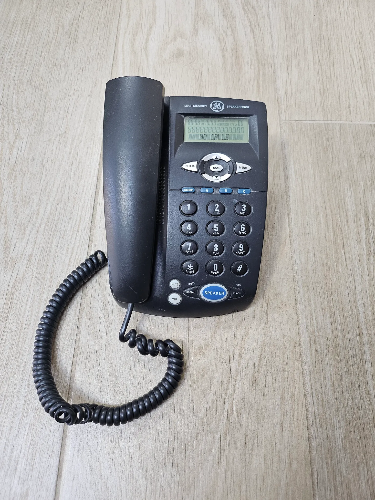 Black landline phone photo 1