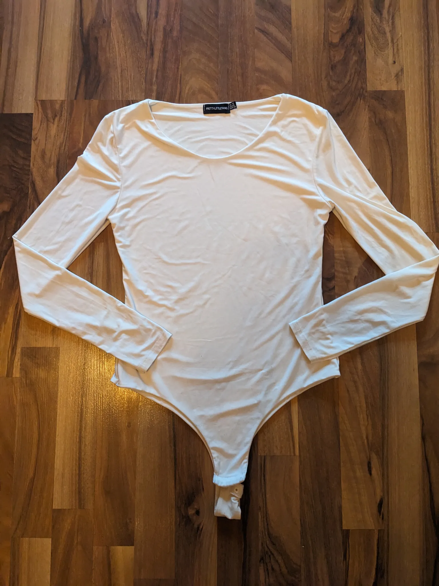 Pretty little things long sleeve bodysuit photo 1