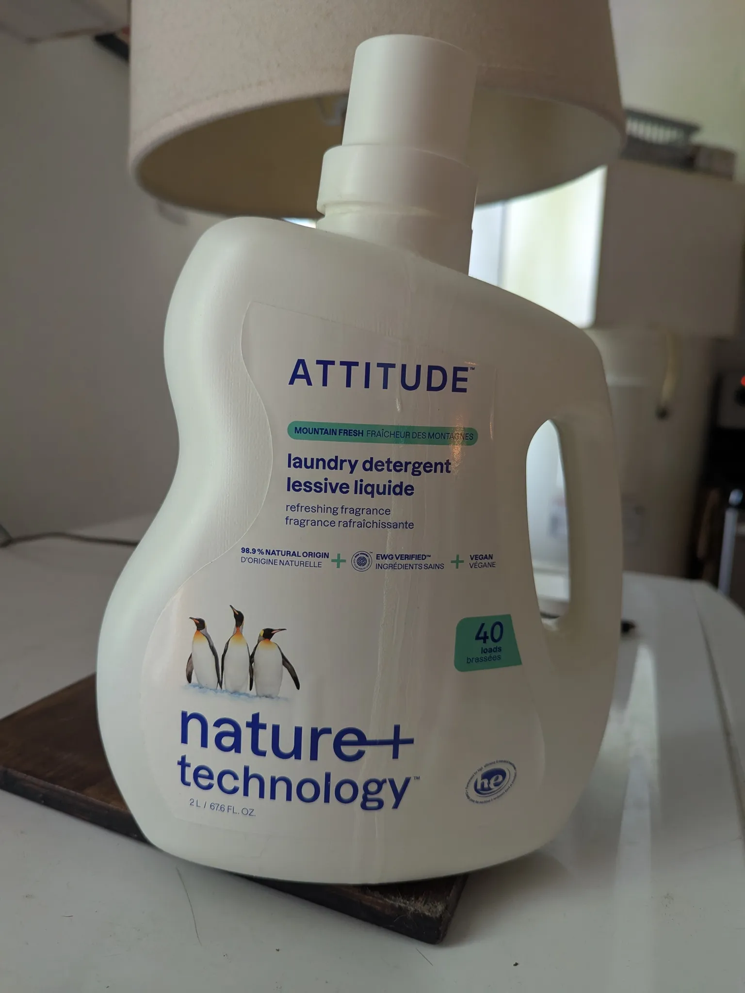 Full bottle of washing machine detergent  photo 1