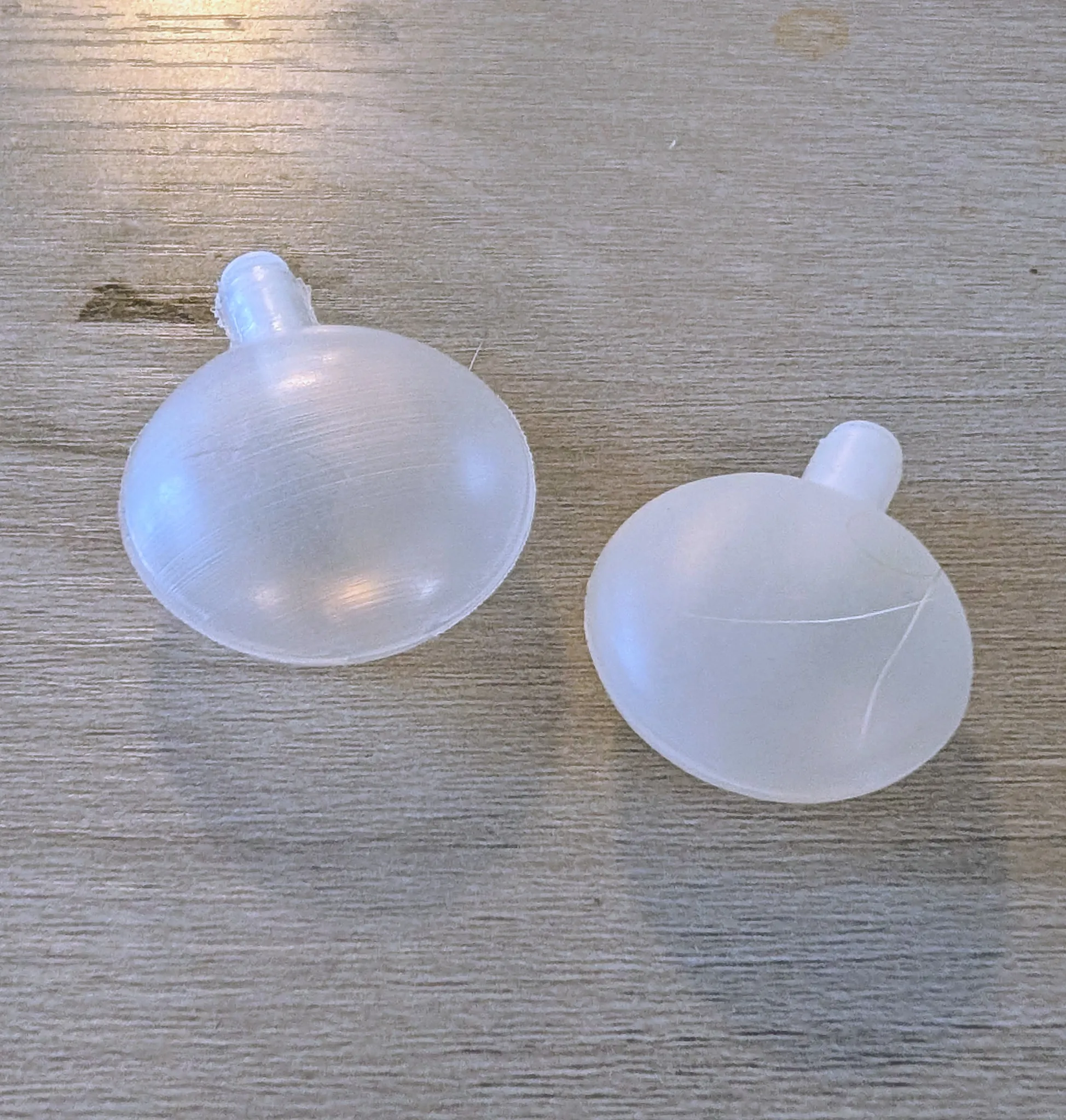 Two Clear Plastic Replacement Squeakers for Toys  photo 1