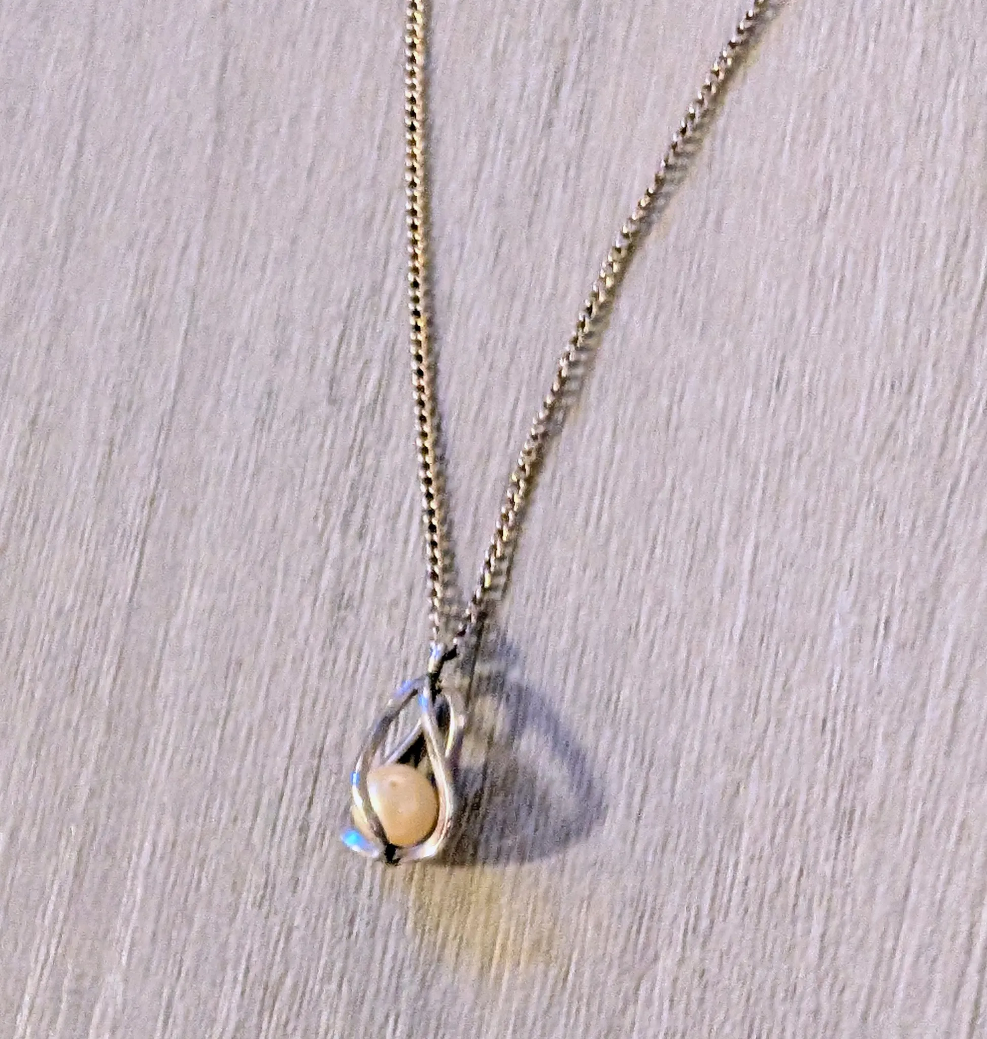 Silver Tone Pendant Necklace with Faux Pearl Accent photo 1
