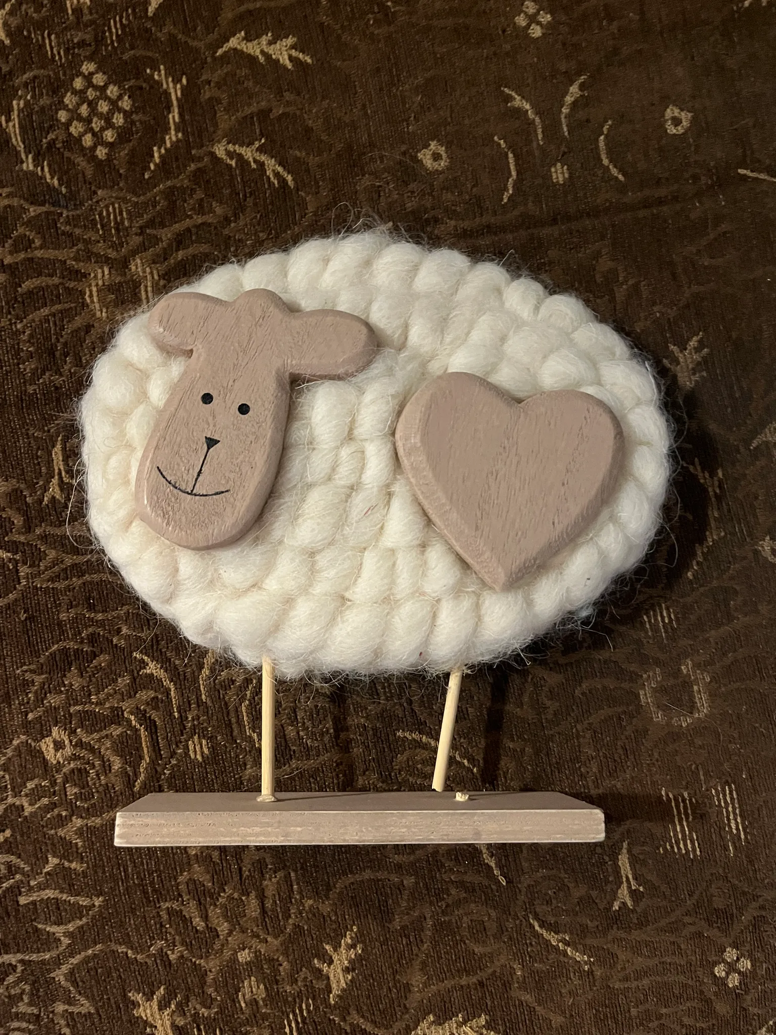 Wood and wool sheep with heart decoration  photo 1