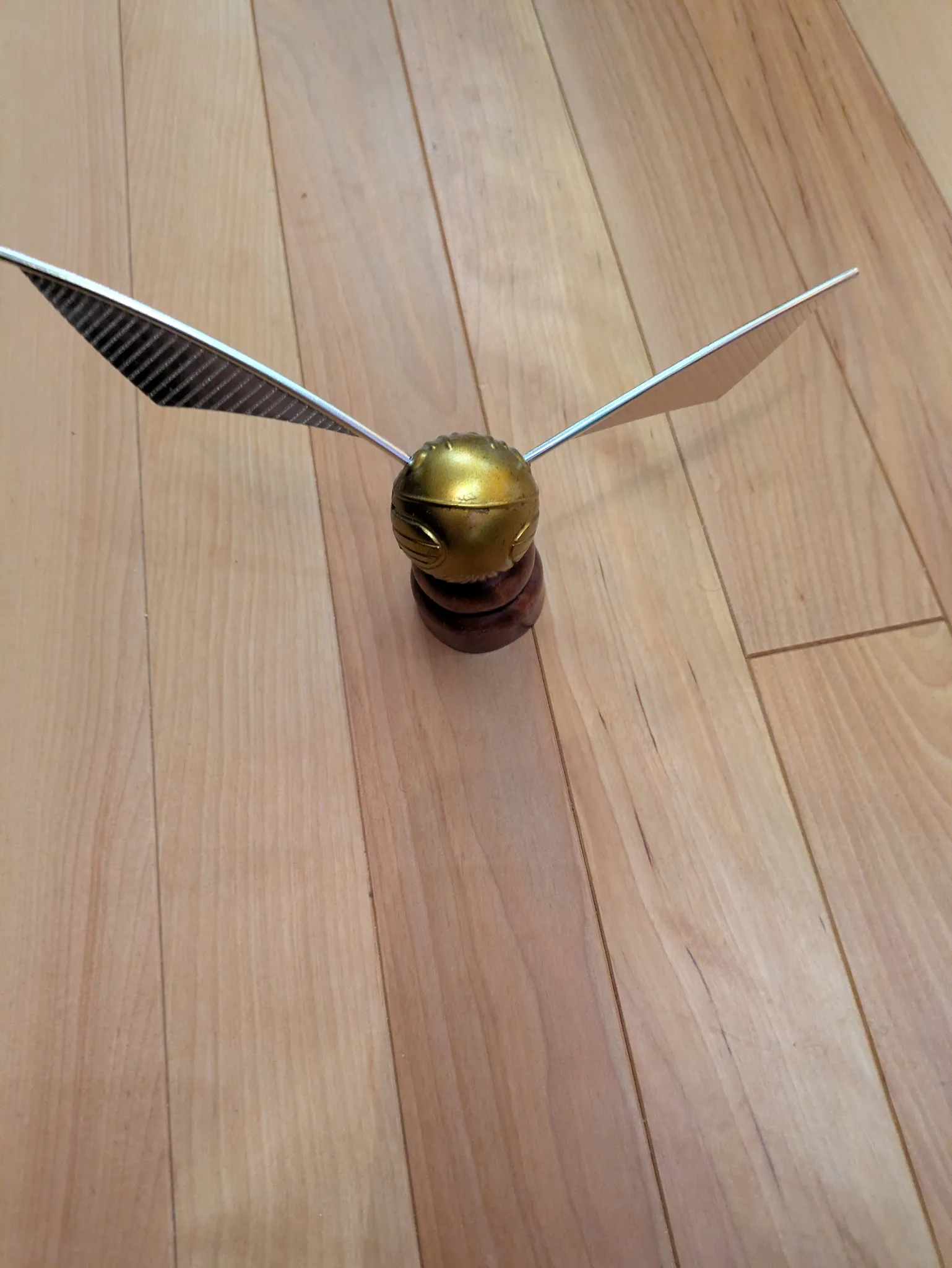 Golden snitch decoration photo 1