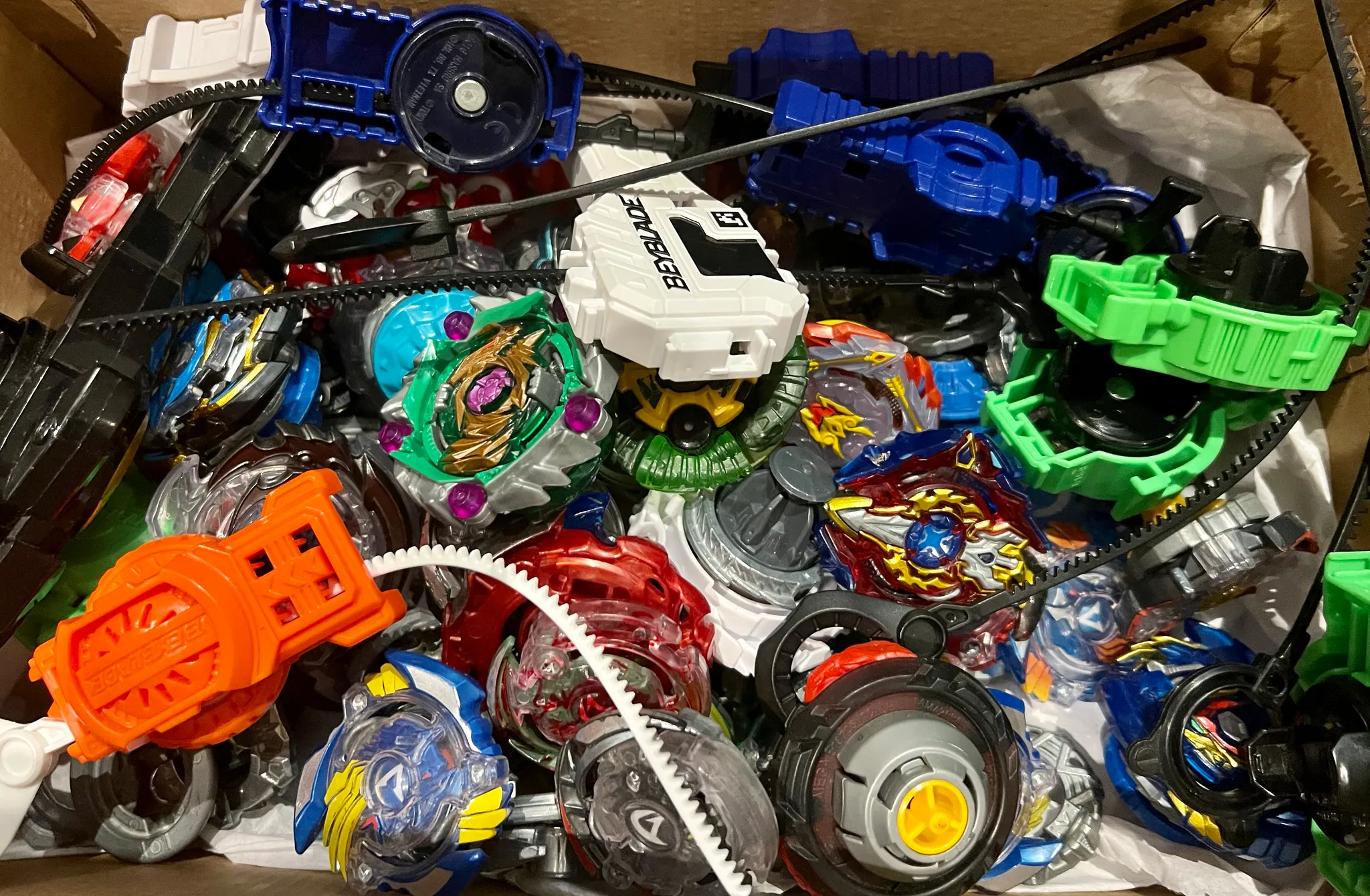 Box of Beyblades & Case photo 1